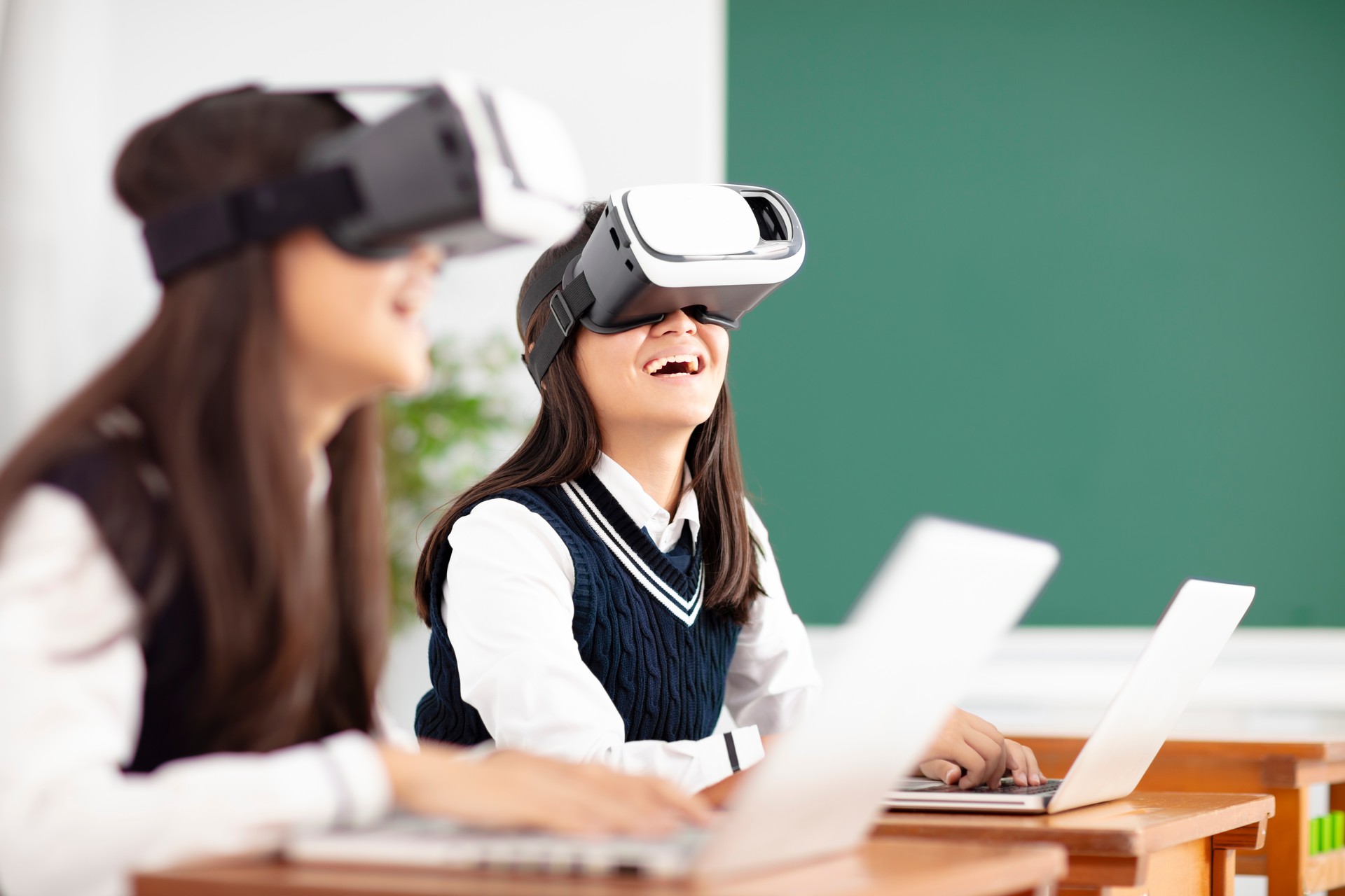 teenagers student with virtual reality headset in classroom