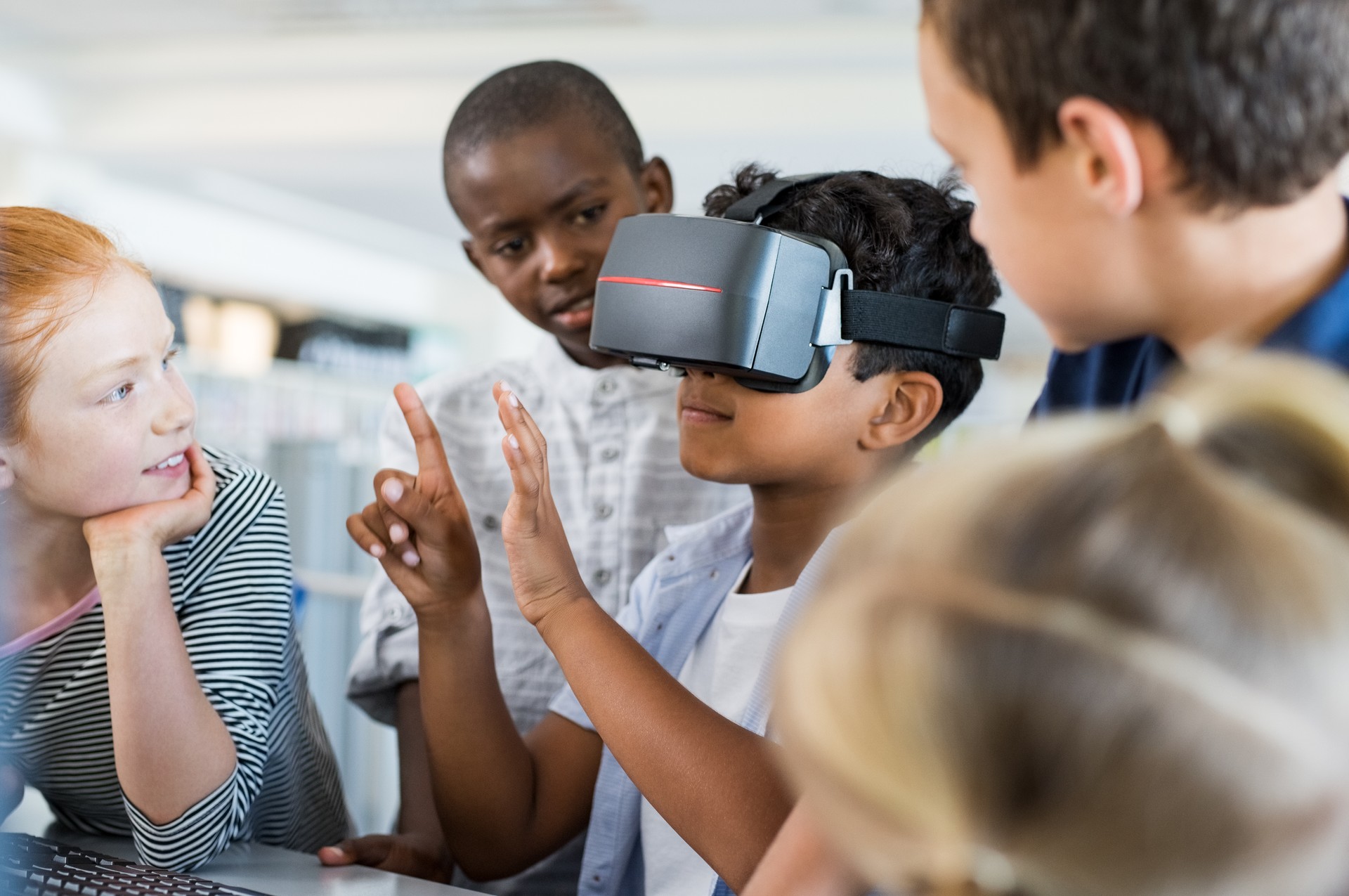 Boy using virtual goggles